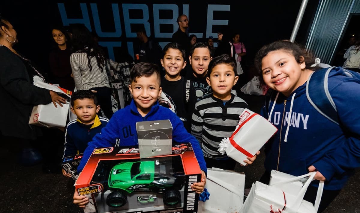 A moment from the Trina's Kids Holiday Toy Drive